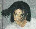 Michael Jackson with a litte beard - his hair is weaving in the wind
